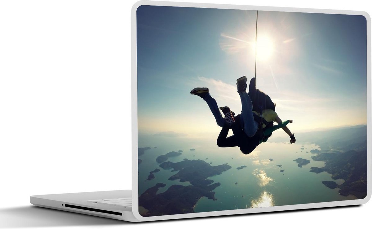 Afbeelding van product SleevesAndCases  Laptop sticker - 11.6 inch - Parachutist boven zee bij zonsopkomst