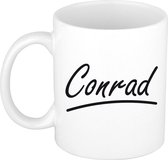 Conrad naam cadeau mok / beker met sierlijke letters - Cadeau collega/ vaderdag/ verjaardag of persoonlijke voornaam mok werknemers