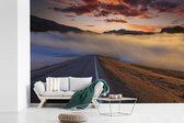 Behang - Fotobehang De mistige weg naar de Noordkaap in Noorwegen - Breedte 330 cm x hoogte 220 cm