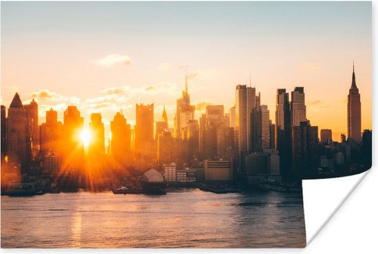 Poster Le lever du soleil sur les toits de Manhattan 180x120 cm - Tirage photo sur Poster (décoration murale salon / chambre) XXL / Groot format!