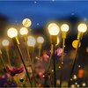 foto van Solar Garden Lights Firefly - Solar Lichtbolletjes - Lichtbollen - Solar Garden Lights - Firefly Lights - Vuurvliegjes - Zonne Energie Lampjes - Led Lampjes - Set van 2! - Waterproof - Bruiloft - Buitenverlichting -