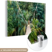MuchoWow® Glasschilderij 180x120 cm - Schilderij acrylglas - Jungle - Palmboom - Brug - Natuur - Planten - Foto op glas - Schilderijen