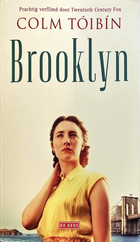 Boekomslag van Brooklyn, met een vrouw in een gele jurk en de Brooklyn Bridge op de achtergrond.
