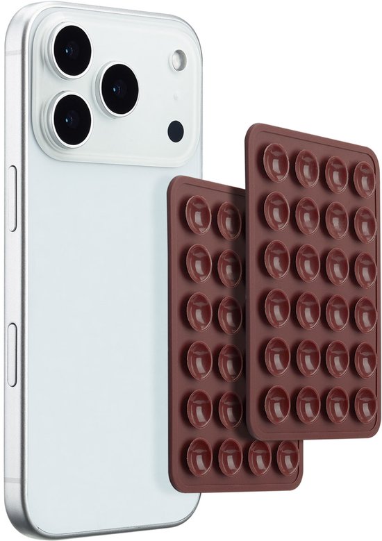 Deux plaques brunes à ventouse de 24 ronds, à l'arrière d'un iPhone blanc.