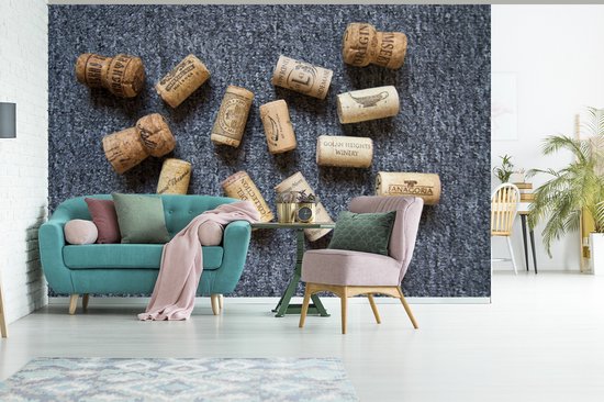 Quelques bouchons sur fond gris fond d' fotobehang