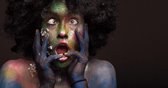 Woman portrait with afro hair style. Face art and body art. Fantasy painted girl smiling. Bright green and violet make up - Modern Art Canvas - Horizontal - 243472498 - 115*75 Hori