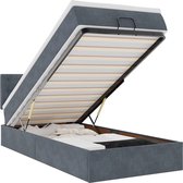 Donkergrijs bedframe met openklapbare matras en opbergruimte, met gestoffeerd hoofdbord.