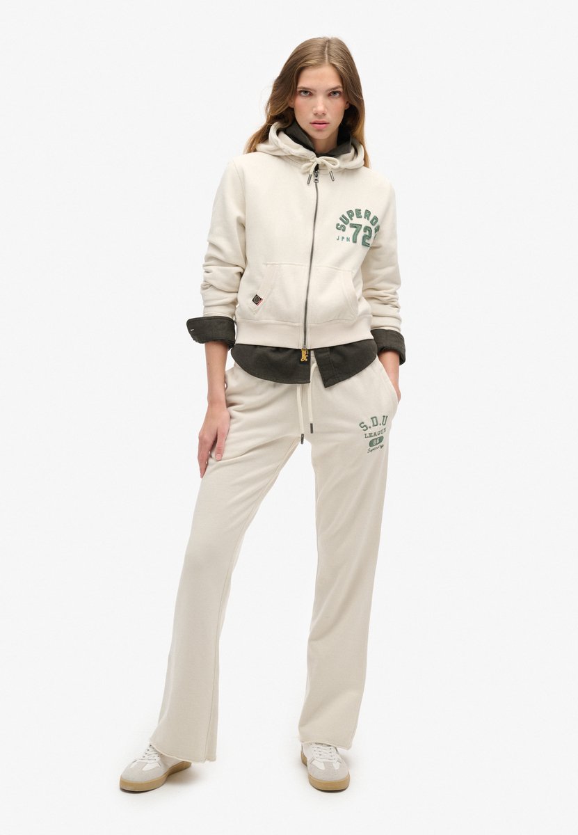 Superdry Athletic Essentials joggingbroek met lage taille en wijde pijpen Dames Broeken Creme