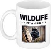 Zwarte panter mok met dieren foto wildlife of the world