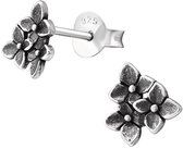 Joy|S - Zilveren bloemen oorbellen - Bali bloem oorknoppen - 7 mm - geoxideerd