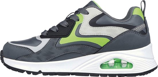 Grijze sneaker met limegroene en witte accenten en een luchtdempende zool.