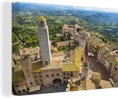 Canvas Schilderij San Gimignano van bovenaf bij Toscanië in Italië - 60x40 cm - Wanddecoratie