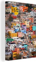 Canvas Schilderij Tropische Favela van Leon in Spanje - 80x120 cm - Wanddecoratie