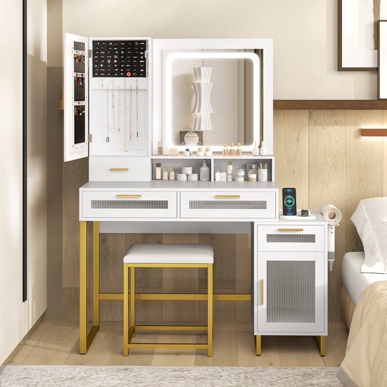 Coiffeuse blanche avec miroir à led, pieds dorés, tabouret, armoire à bijoux et tiroirs.