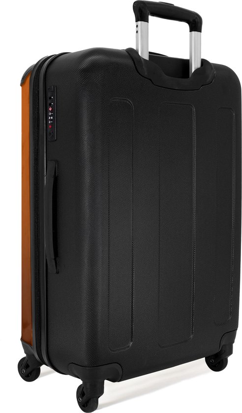 NoBoringSuitcases.com® - Grande valise enfant Un footballeur Ã la lumiÃ¨re orange dans un moment de flottement - Bagage - Valise de voyage pour garÃ§on - Valise chariot - Valises 67cm