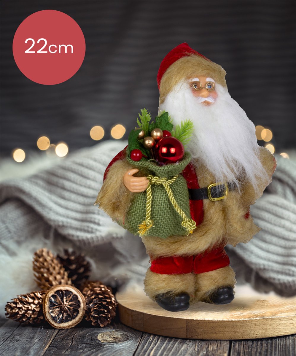 Handgemaakte Kerstman met rood/bruinige kleding en juten zak met kerstballen onder de arm - 22cm
