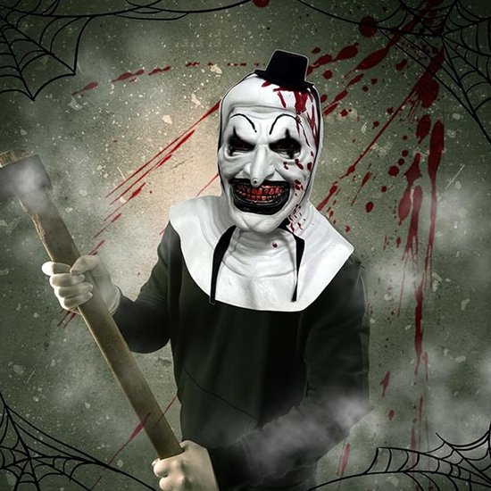 Fille Dans Un Masque D'un Clown Aux Parties Des Enfants Image stock