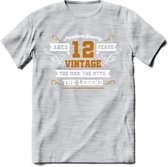 12 Jaar Legend T-Shirt | Goud - Wit | Grappig Verjaardag en Feest Cadeau Shirt | Dames - Heren - Unisex | Tshirt Kleding Kado | - Licht Grijs - Gemaleerd - XL