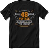 48 Jaar Legend T-Shirt | Goud - Zilver | Grappig Verjaardag Cadeau | Dames - Heren | - Zwart - L