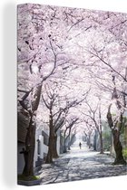 Canvas schilderij 120x160 cm - Wanddecoratie Japanse straat met Sakura bomen in april - Muurdecoratie woonkamer - Slaapkamer decoratie - Kamer accessoires - Schilderijen