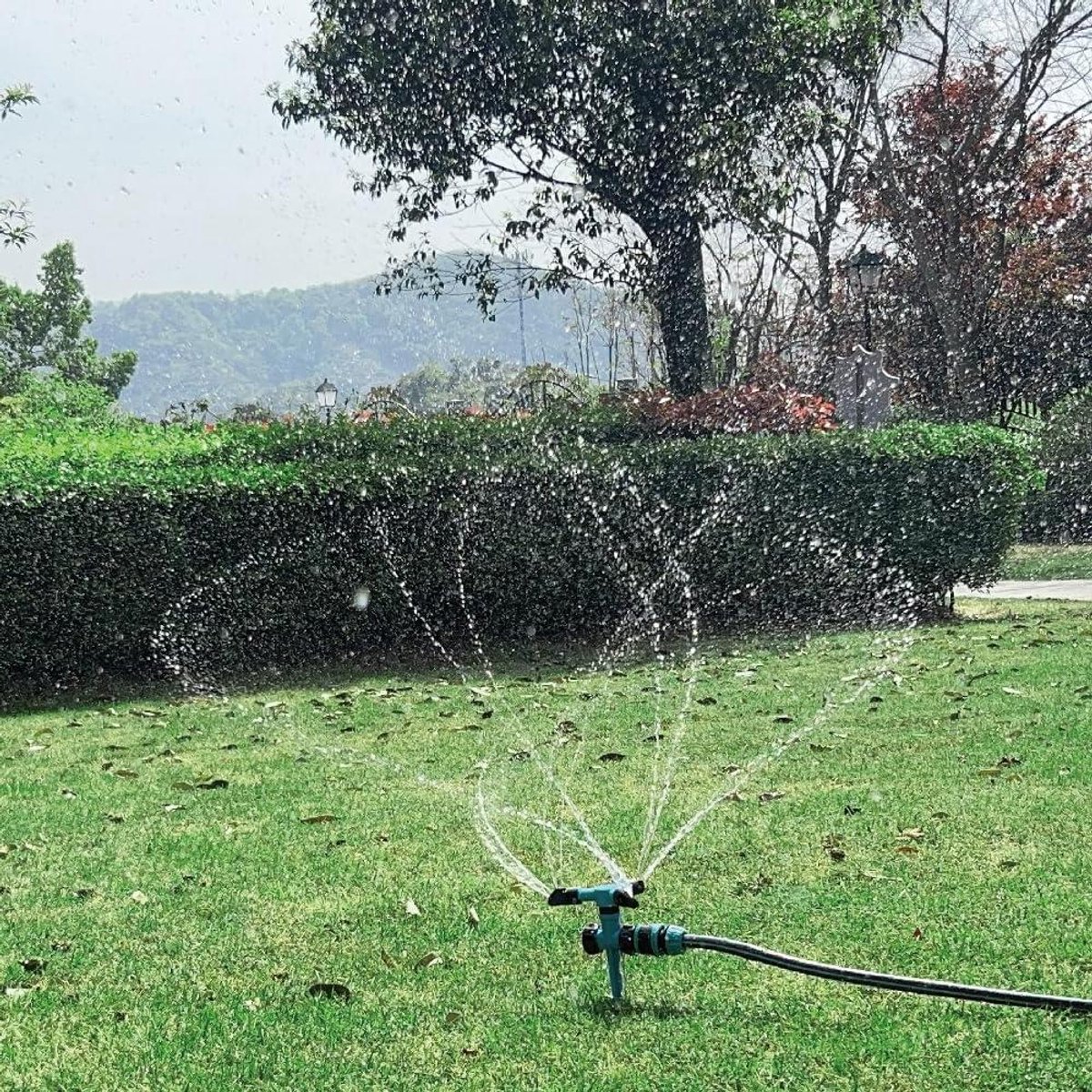 Tuinsproeier Roterend - Gazon watergever - Gazon Bewateren - 360 Graden Dekking - Groot Oppervlak - Lichtblauw