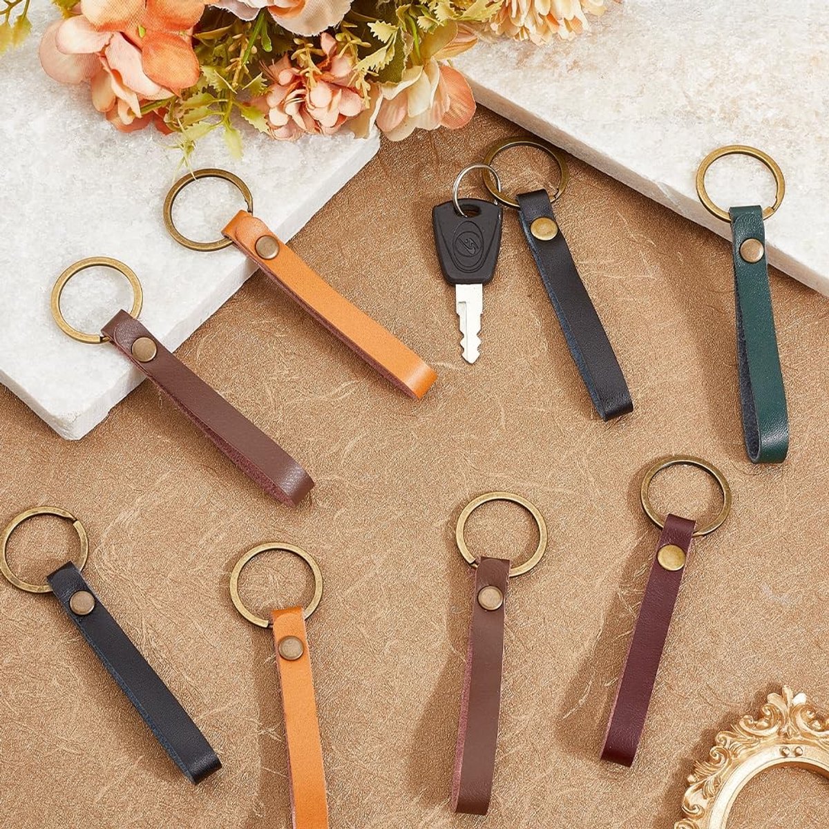 Dailygoods - Set van 10 Koeienhuid Sleutelhangers in 5 Kleuren
