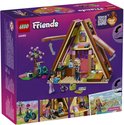 Lego Friends speelgoedhuisje met roze accenten, fiets, boom en poppetjes. De doos toont het huisje en poppetjes.