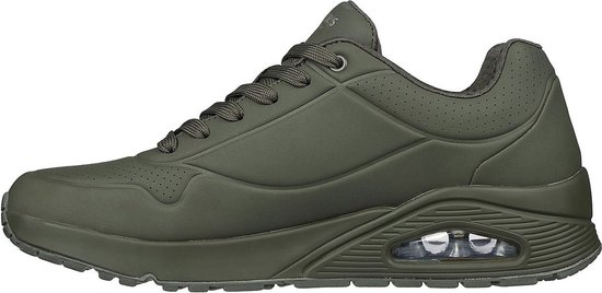 Sneaker Skechers verte, vue de profil avec l'amorti air caractéristique dans la semelle.