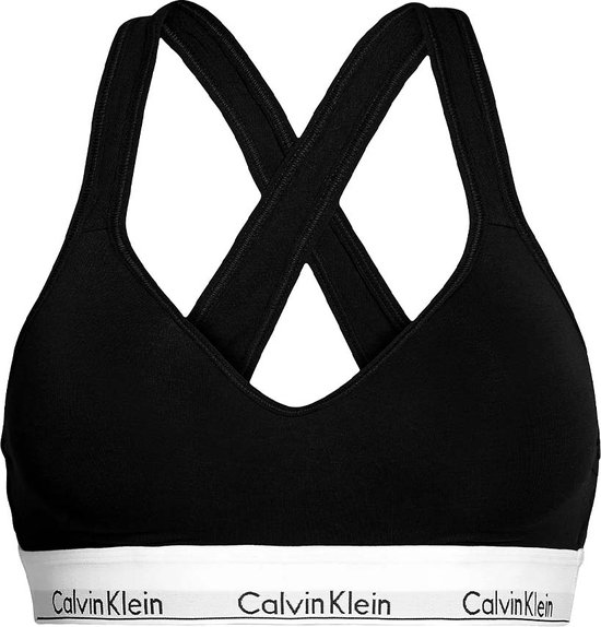 Zwarte Calvin Klein bralette met gekruiste bandjes en witte tailleband met logo.