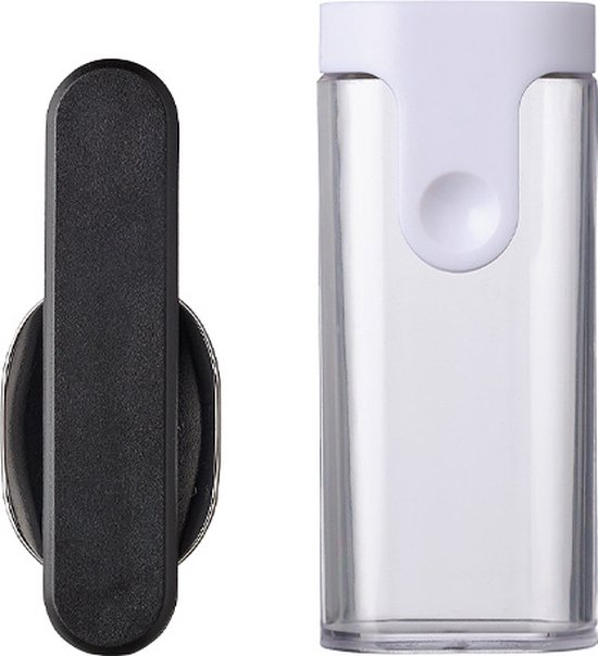 Manche noir de cuillère pliable posé à côté d'une boîte de rangement transparente avec couvercle blanc.