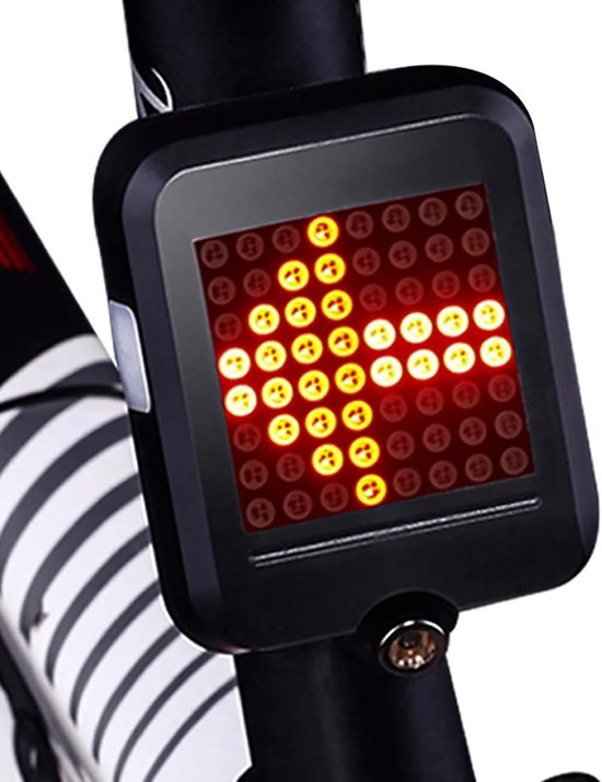 Zwart fietsachterlicht met rode LED-pijlen die een rechtsaf richtingaanwijzer vormen.