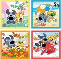Vier vierkante puzzels met elk 6 stukjes. De puzzels tonen de honden Woezel en Pip in verschillende seizoenen.