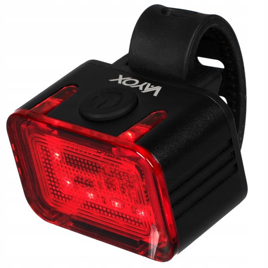 Zwart Vayox fiets achterlicht met rode LED's, knop bovenop en USB-C aansluiting.
