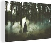 Canvas Schilderij Spookachtige heks in het bos - 60x40 cm - Wanddecoratie
