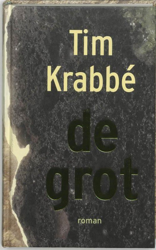 Boek 'De Grot' van Tim Krabbé. Titel en auteursnaam in gele letters op een donkergrijze, ruwe achtergrond.
