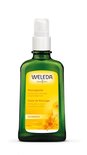 Weleda Massageolie in groene fles met gele sticker. Tekst: "Massageolie Verwarmt en verzorgt de gevoelige huid CALENDULA".