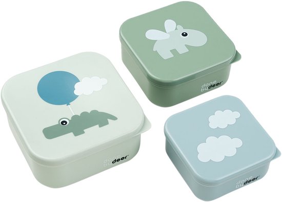 Trois boîtes à goûter Done By Deer : verte avec éléphant, vert clair avec crocodile et ballon, bleu clair avec nuages.