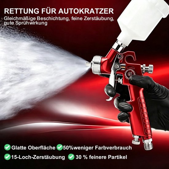 Rood spuitpistool met zwarte handschoen spuit fijne verfnevel voor autokrassen.