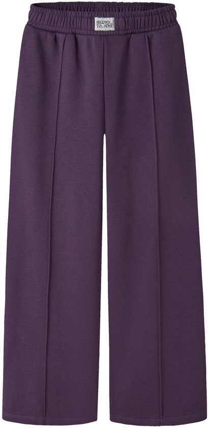 Pantalon violet à jambes larges, taille élastique et étiquette « SECOND TO ONE » sur le devant.