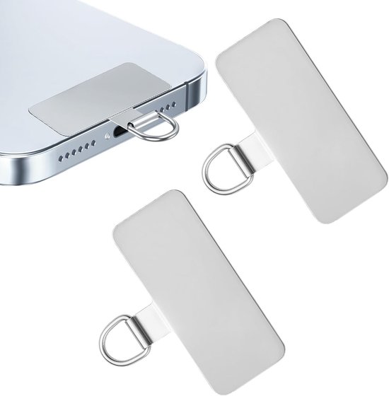 Deux patchs argentés métalliques pour lanière de téléphone avec anneaux, attachés à un smartphone.