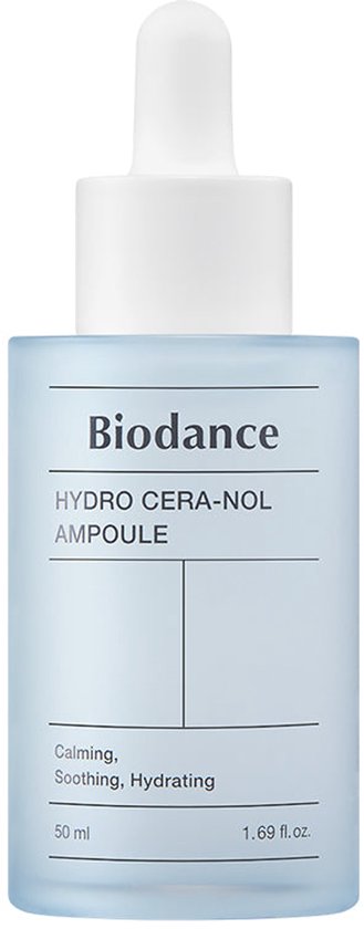 Lichtblauwe, doorzichtige fles met witte dop en druppelaar. Tekst: Biodance HYDRO CERA-NOL AMPOULE, 50 ml.