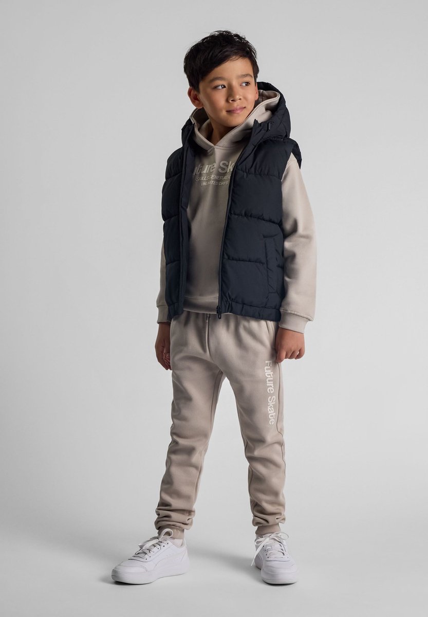 Minoti gewatteerde bodywarmer jongens met capuchon - zwart - rits
