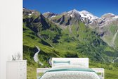Behang - Fotobehang De Grossglockner weg die door de Oostenrijkse Alpen - Breedte 315 cm x hoogte 260 cm