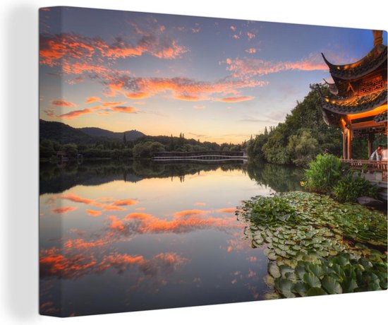 Canvas Schilderij Zonsondergang Hangzhou China - 60x40 cm - Wanddecoratie