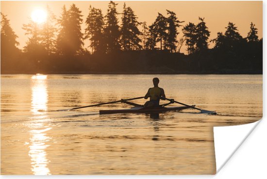 Un homme rame à un coucher de soleil Poster 120x80 cm - Tirage photo sur Poster (décoration murale salon / chambre) / Affiche de Sport