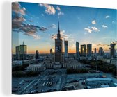 Canvas Schilderij Warschau - Skyline - Lucht - 120x80 cm - Wanddecoratie