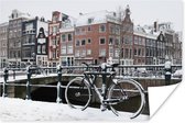Amsterdam bedekt met sneeuw Poster 90x60 cm - Foto print op Poster (wanddecoratie woonkamer / slaapkamer)