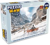 Puzzel Man op een bank tijdens de winter in Zwitserland - Legpuzzel - Puzzel 500 stukjes