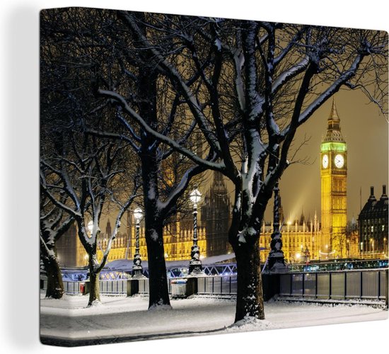 Canvas schilderij 160x120 cm - Wanddecoratie De Big Ben tussen de bomen in een winterlandschap in Londen - Muurdecoratie woonkamer - Slaapkamer decoratie - Kamer accessoires - Schilderijen