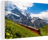 Canvas schilderij 180x120 cm - Wanddecoratie Een rode trein in de Alpen - Muurdecoratie woonkamer - Slaapkamer decoratie - Kamer accessoires - Schilderijen